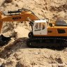 Радиоуправляемый экскаватор HUI NA TOYS масштаб 1/18 - HN1331 (2.4 гГц, 9 каналов управления) артикул HN1331 
